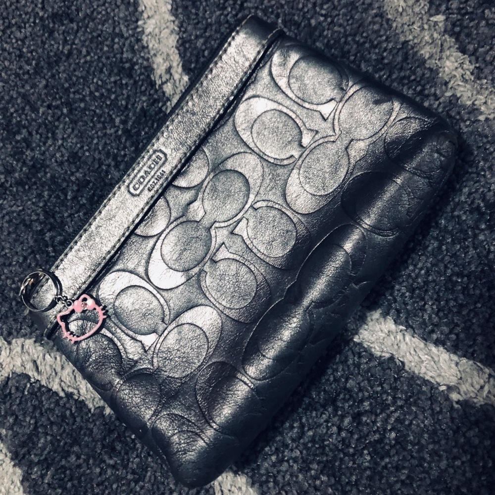 Special edition Hello Kitty silver coach wristlet